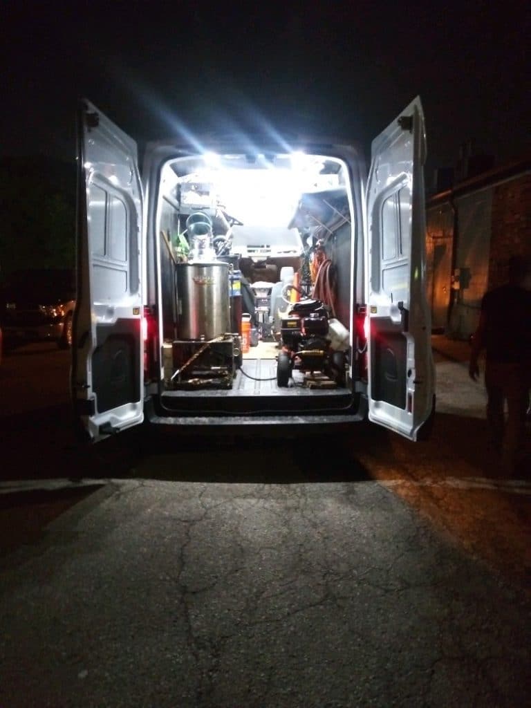 D Poole crew cleaning a commercial kitchen